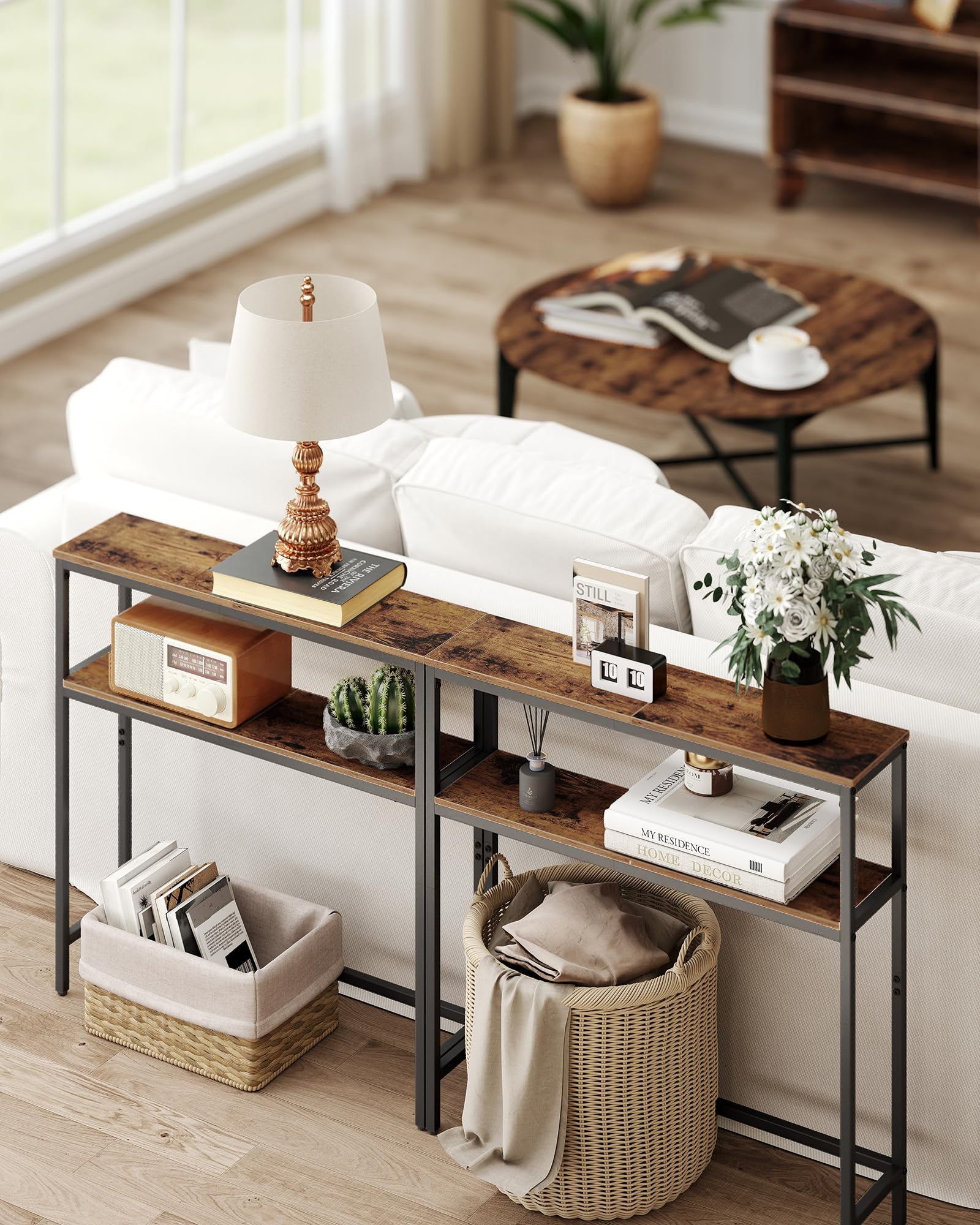 VASAGLE console table styled with photos and a small plant