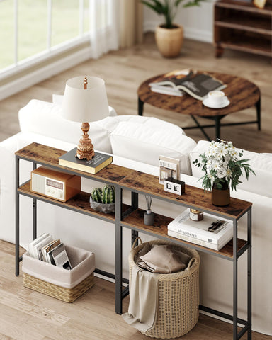 VASAGLE console table styled with photos and a small plant