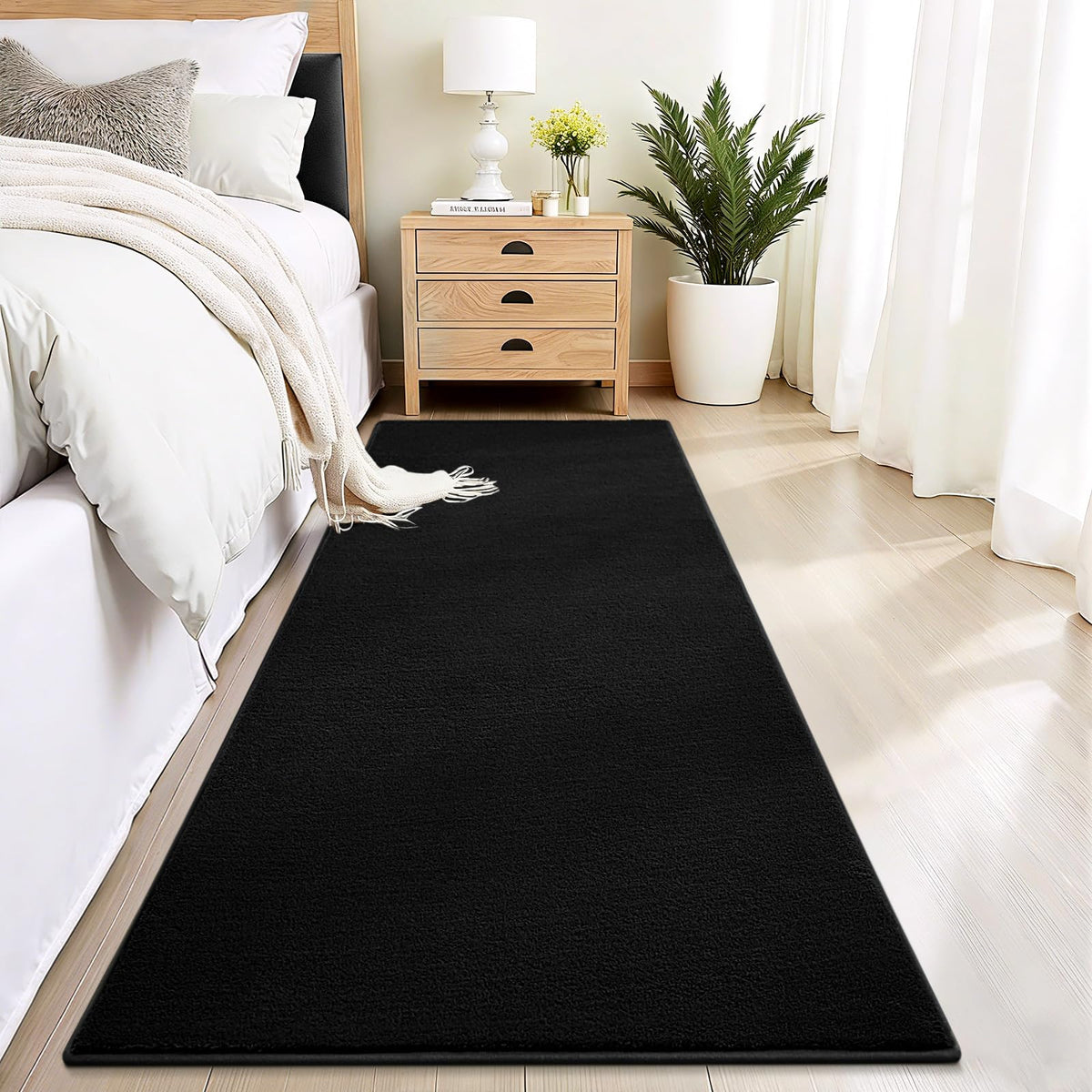 Vasofe black hallway runner rug showing edge detail and sturdy build.