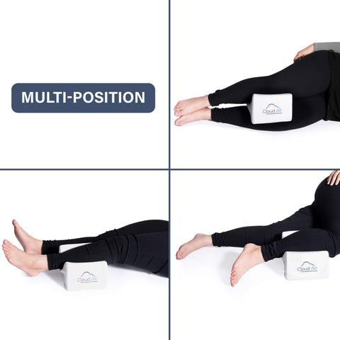 Vaunn knee pillow shown in bed setup for bedside or travel use.