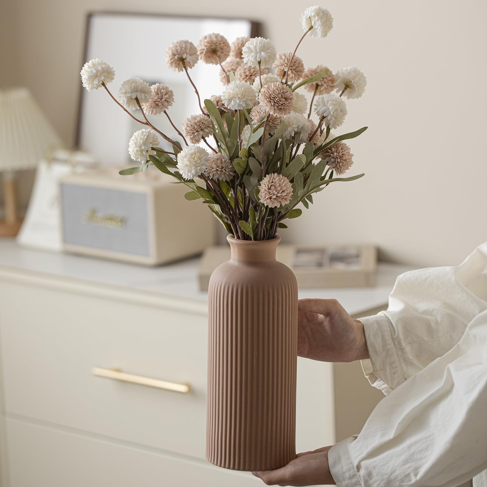 Vaurcesa vase closeup highlights tactile matte ribbing for contemporary appeal