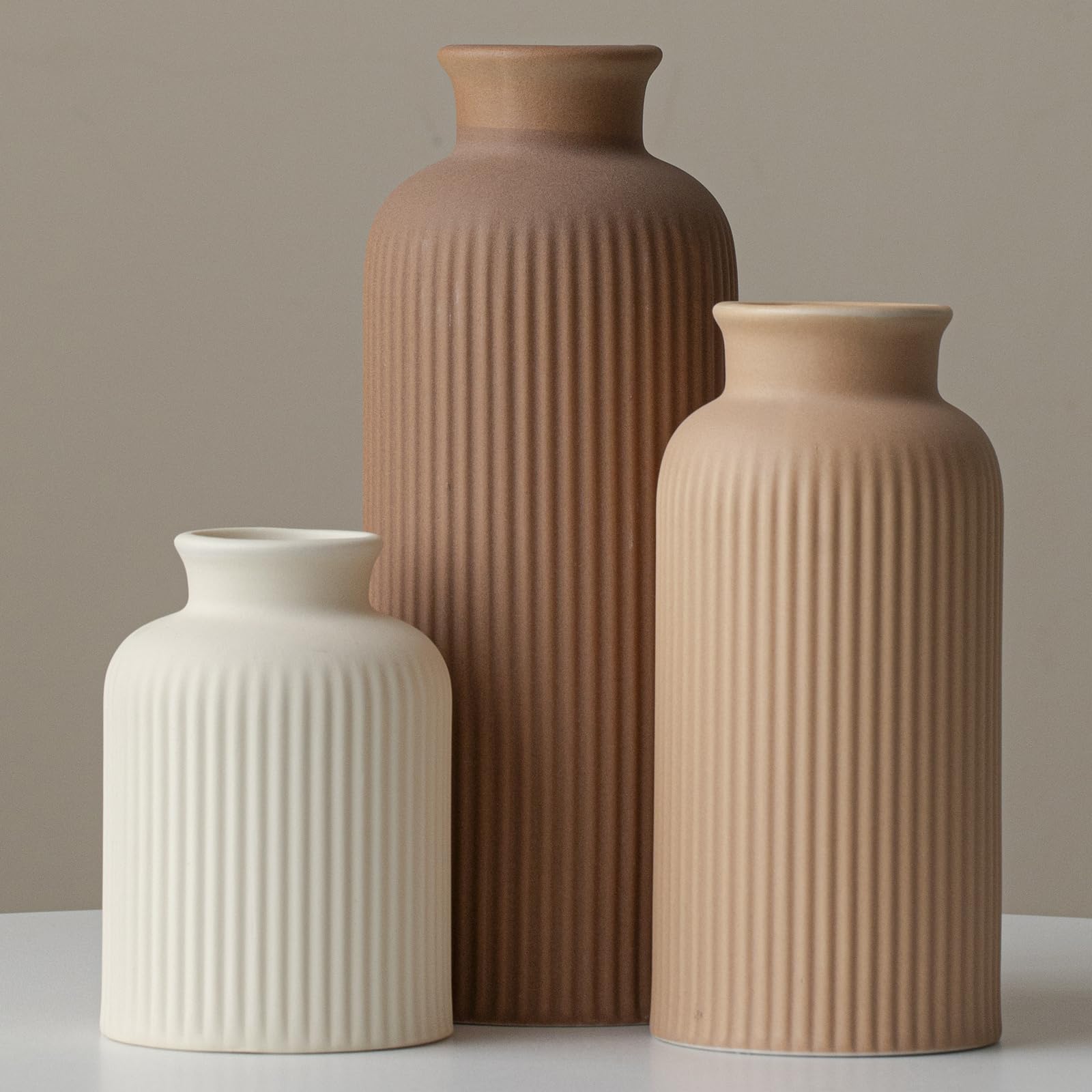 Vaurcesa cream coffee ribbed vase 10in offers an elegant centerpiece with dried flowers