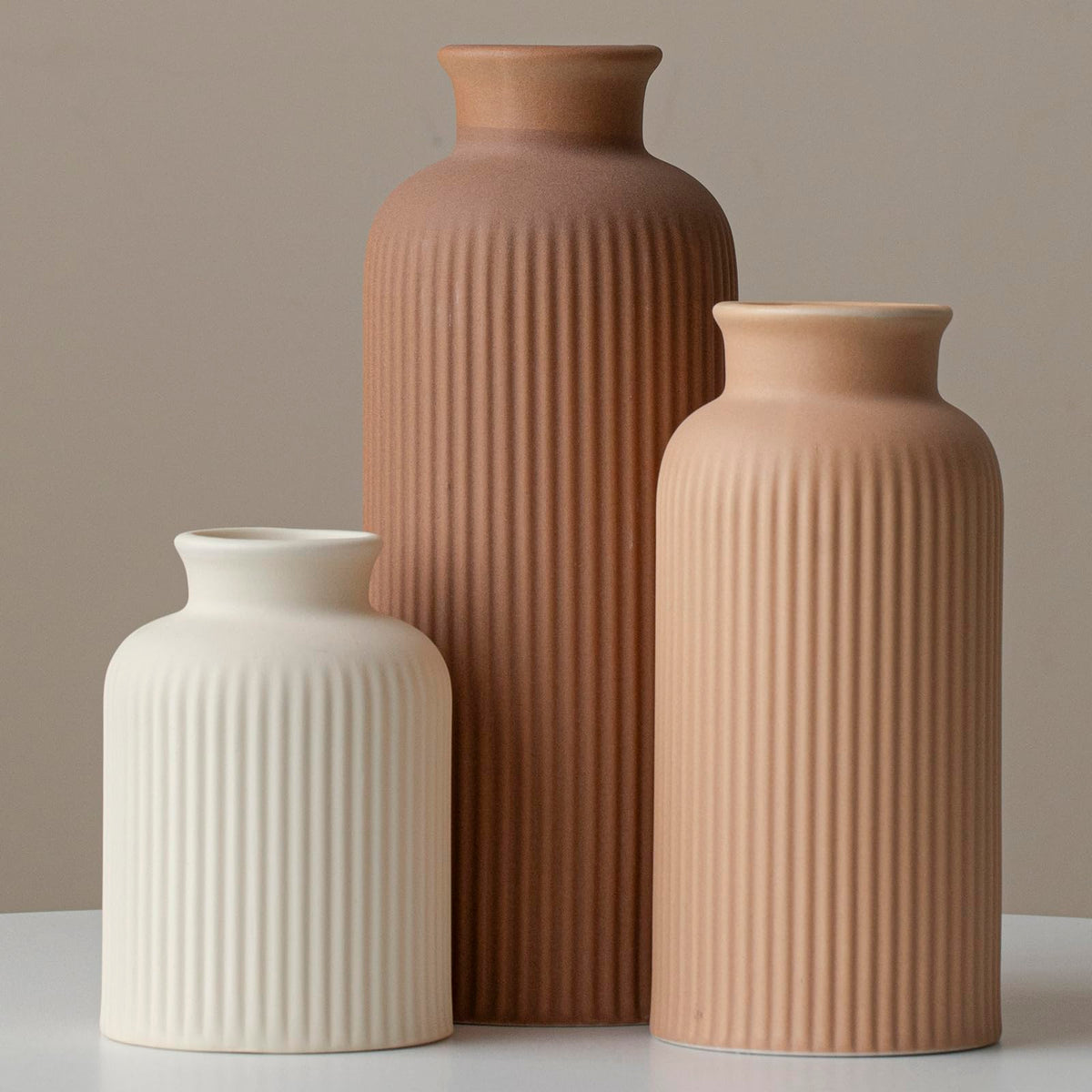 Vaurcesa cream coffee ribbed vase 10in offers an elegant centerpiece with dried flowers