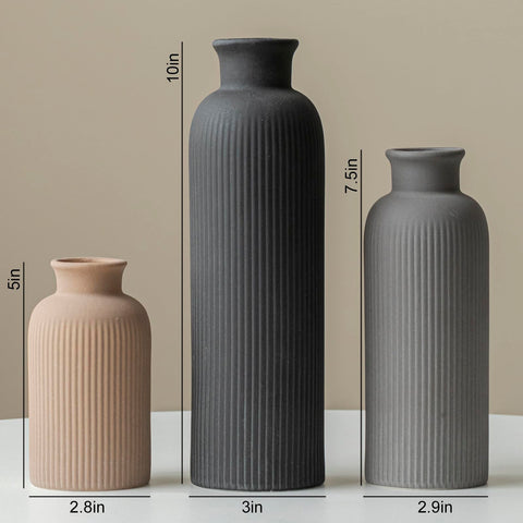 Vaurcesa dried flowers styled in ceramic vases.