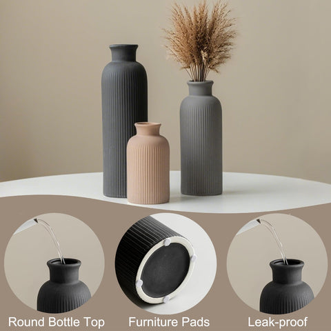 Vaurcesa mixed-height vases add visual interest on a coffee table.