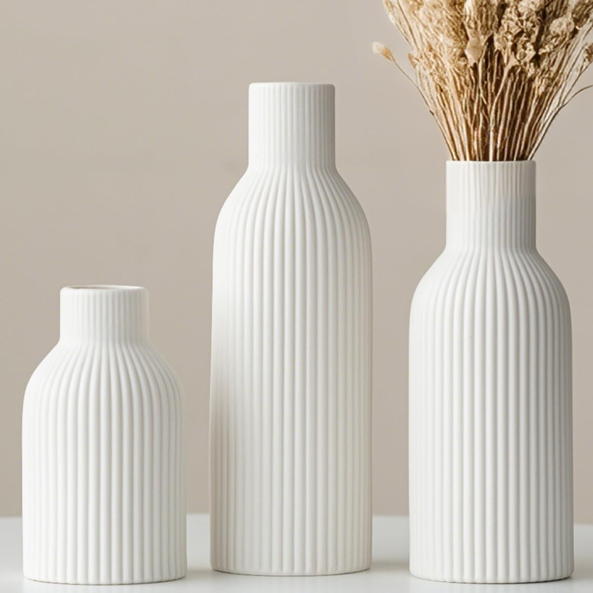 Vaurcesa modern ceramic vases set, ribbed white finish, ideal for contemporary home decor.