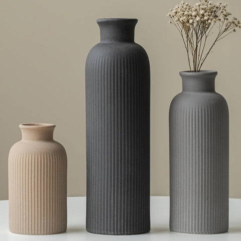 Vaurcesa three-vase collection with ribbed texture for modern decor.