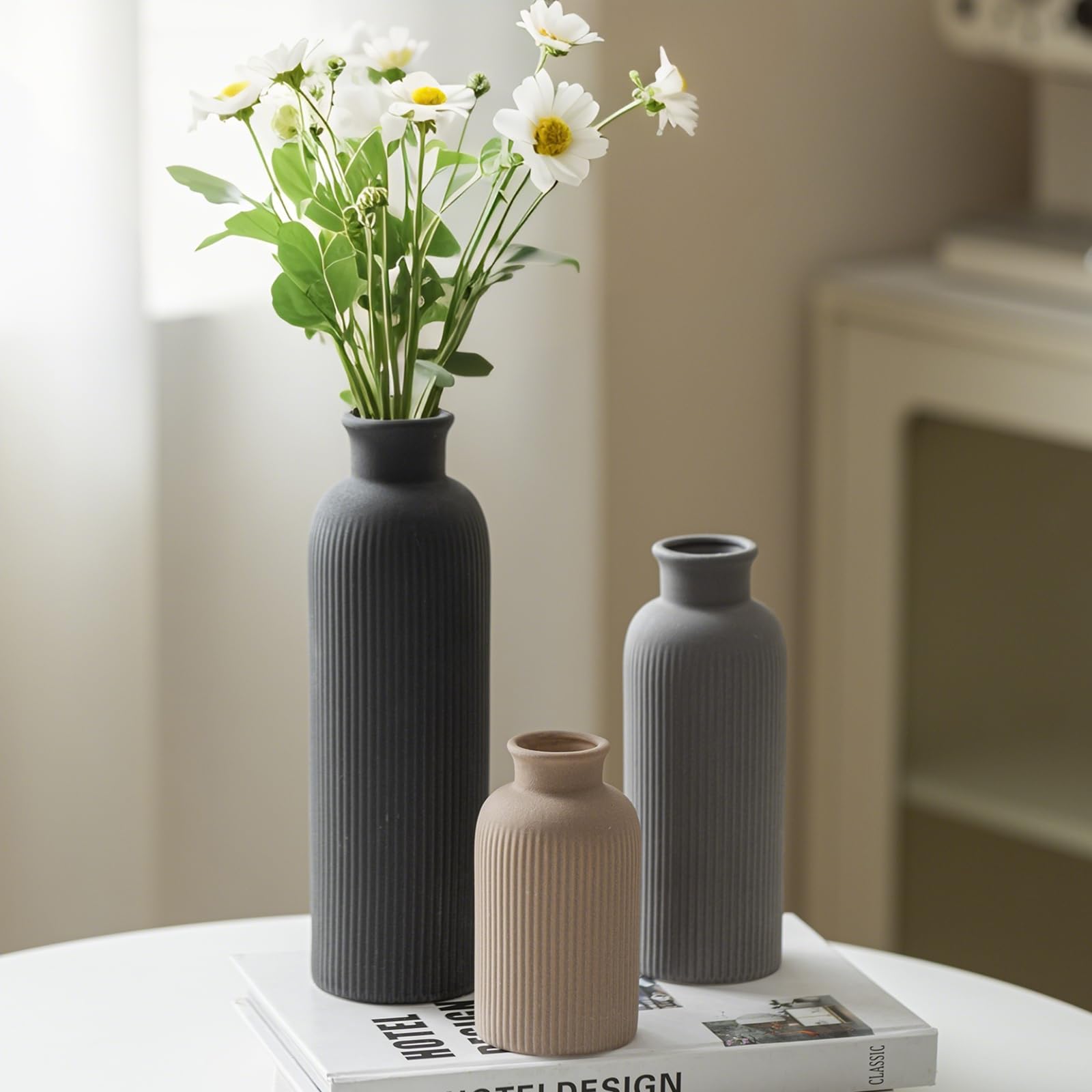 Vaurcesa versatile decor across rooms with modern vase set.