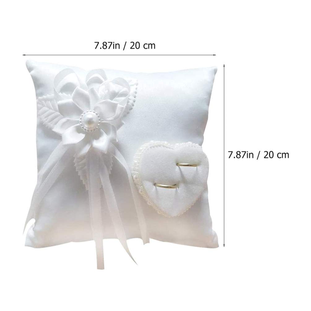 Veemoon ring bearer pillow closeup highlights floral craftsmanship for timeless photos