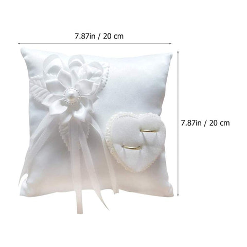 Veemoon ring bearer pillow closeup highlights floral craftsmanship for timeless photos