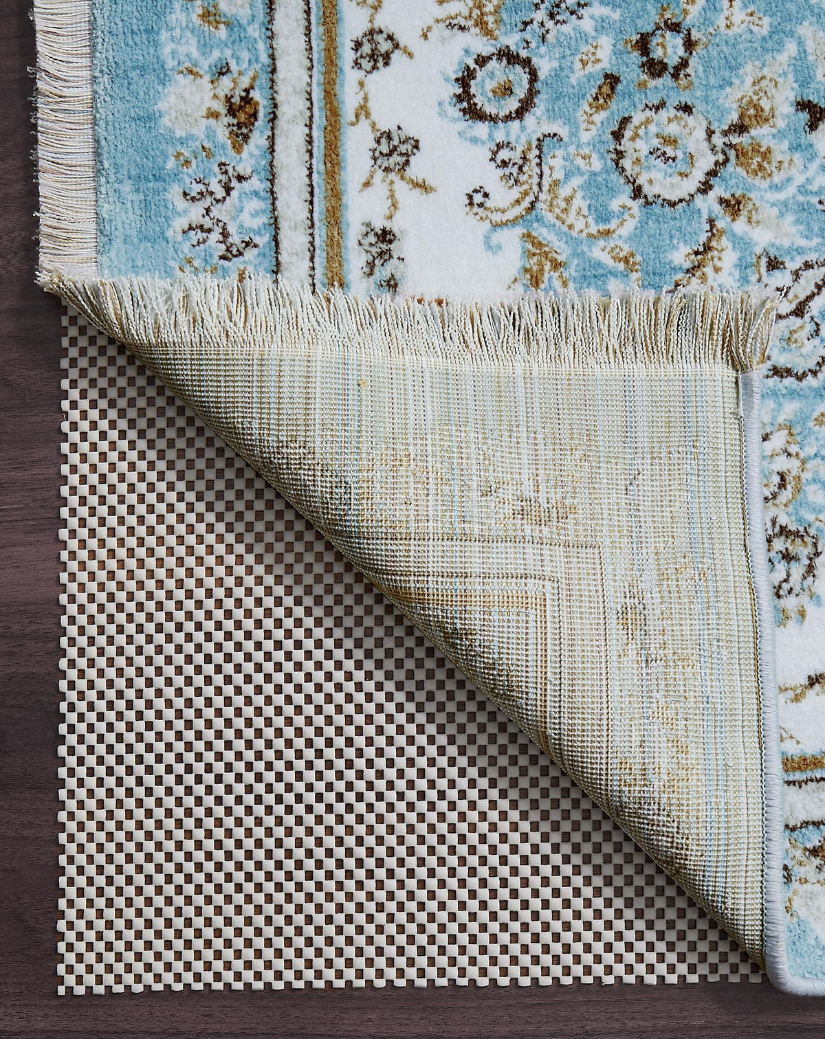 Veken non-slip rug pad 8x10 feet keeps rugs secure and protects floors from wear.