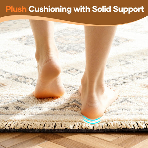 Rug pad being trimmed with household scissors for a custom fit.