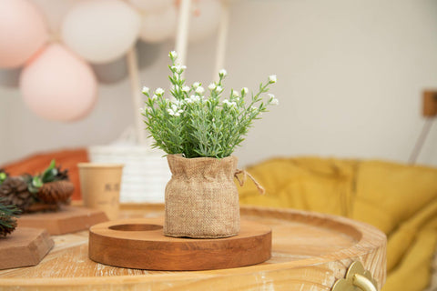 Velener Babys Breath white burlap vase with delicate faux flowers for living room centerpiece.