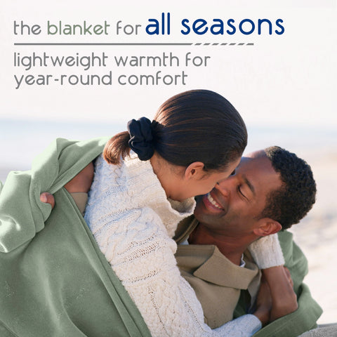 Vellux Original Queen Blanket on couch for cozy lounging.
