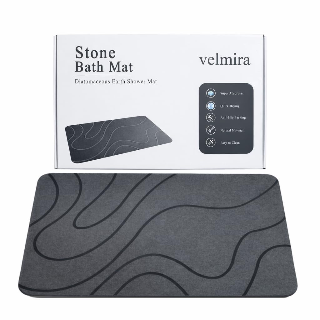 Velmira Stone Bath Mat with porous surface for fast water absorption.