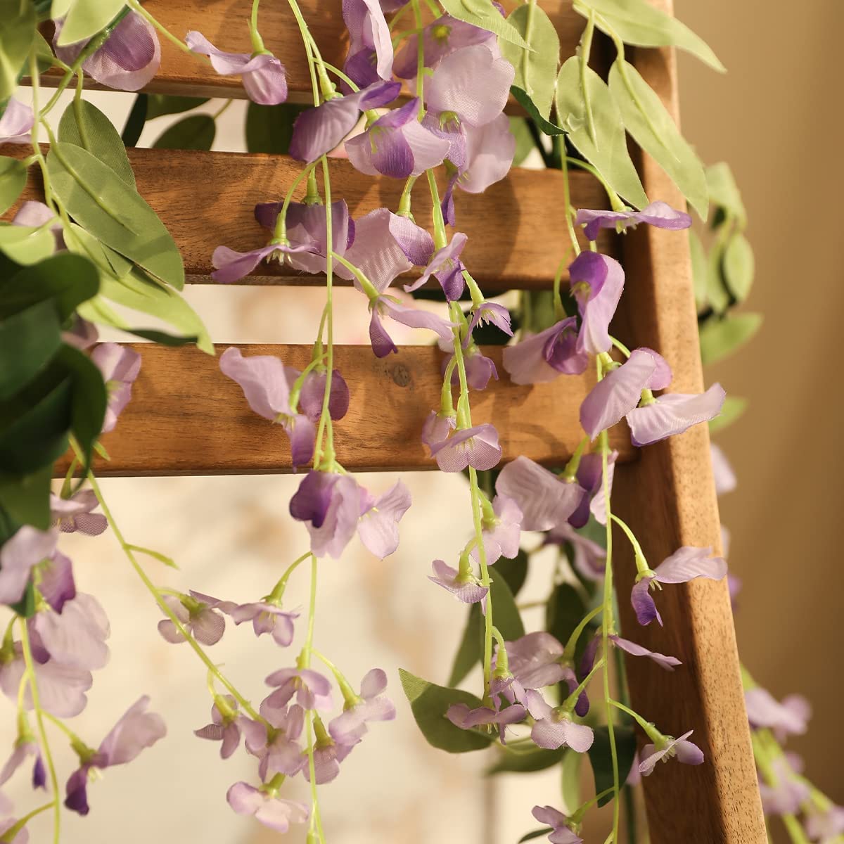 Veryhome wisteria garland wedding backdrop option with full floral fullness.