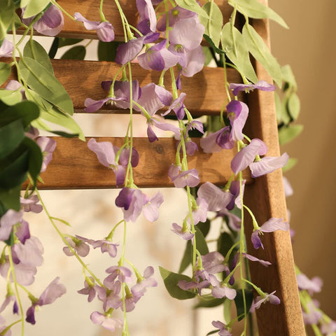 Veryhome wisteria garland wedding backdrop option with full floral fullness.