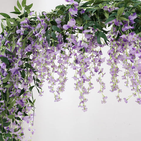 Veryhome wisteria vine close-up shows lifelike petals and flexible stems.