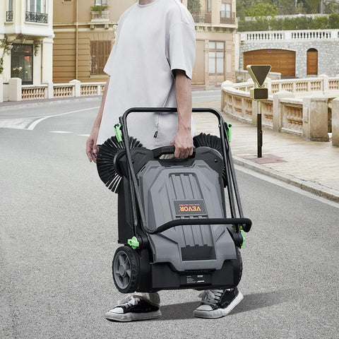 VEVOR walk-behind sweeper wheels on uneven surface for versatile cleaning