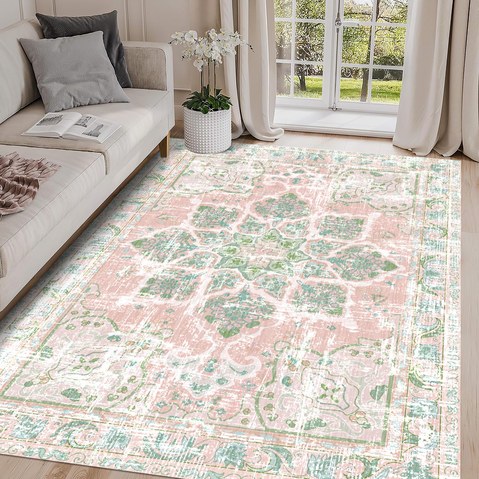 Vhong boho rug in dusty pink and green adds cozy, versatile living room style.