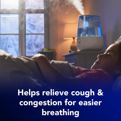 Vicks humidifier in a bedroom setup delivering cool mist for a good night.