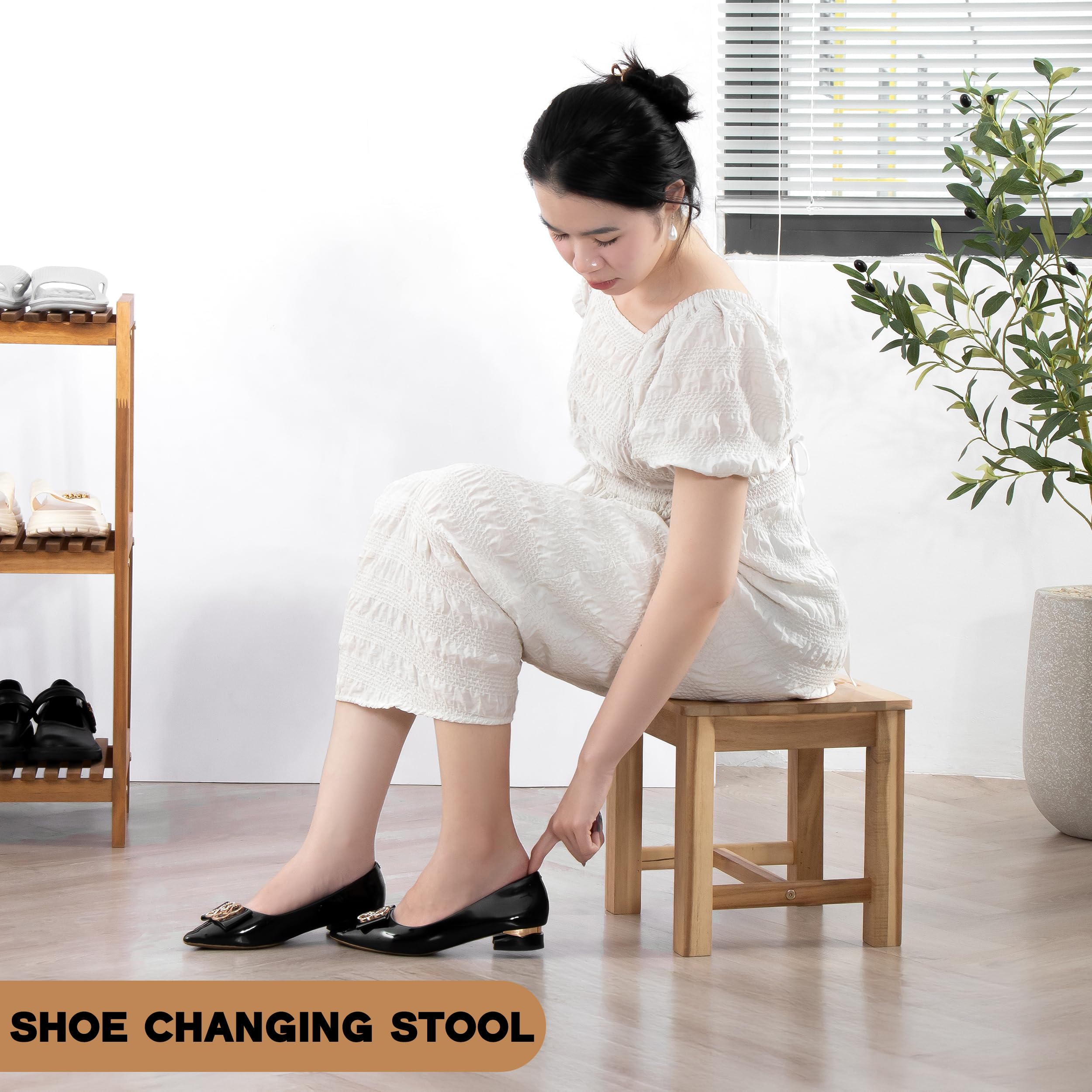 VICTORY RELAX wooden stool doubles as seat, footrest, or side table.