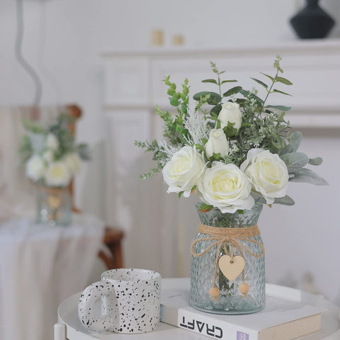 VIERENA artificial silk roses with eucalyptus in a vase for long-lasting beauty.