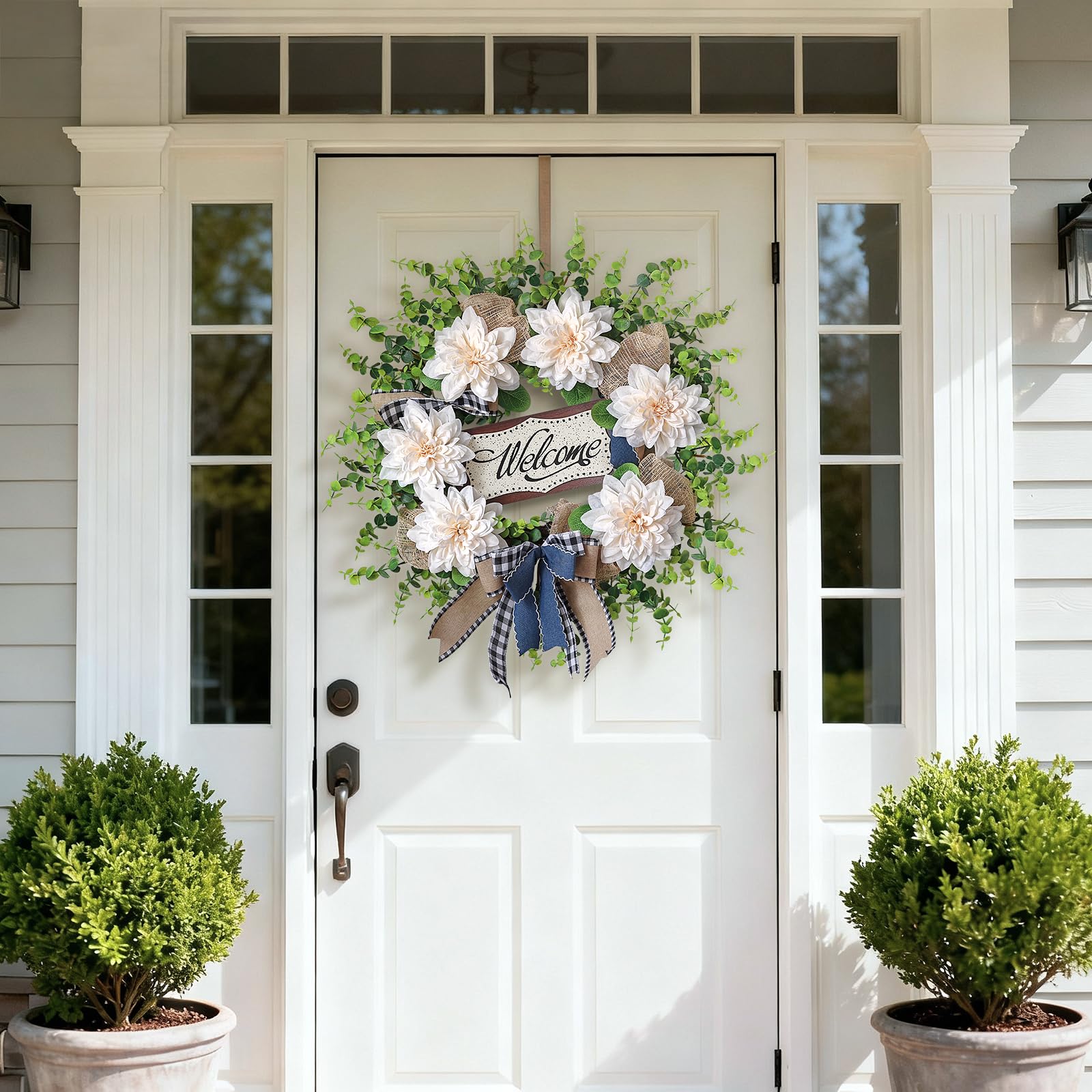Vierena dahlias with eucalyptus leaves add vibrant, durable decor.