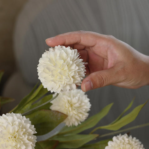 VIERENA pompon mums in a vase add instant elegance