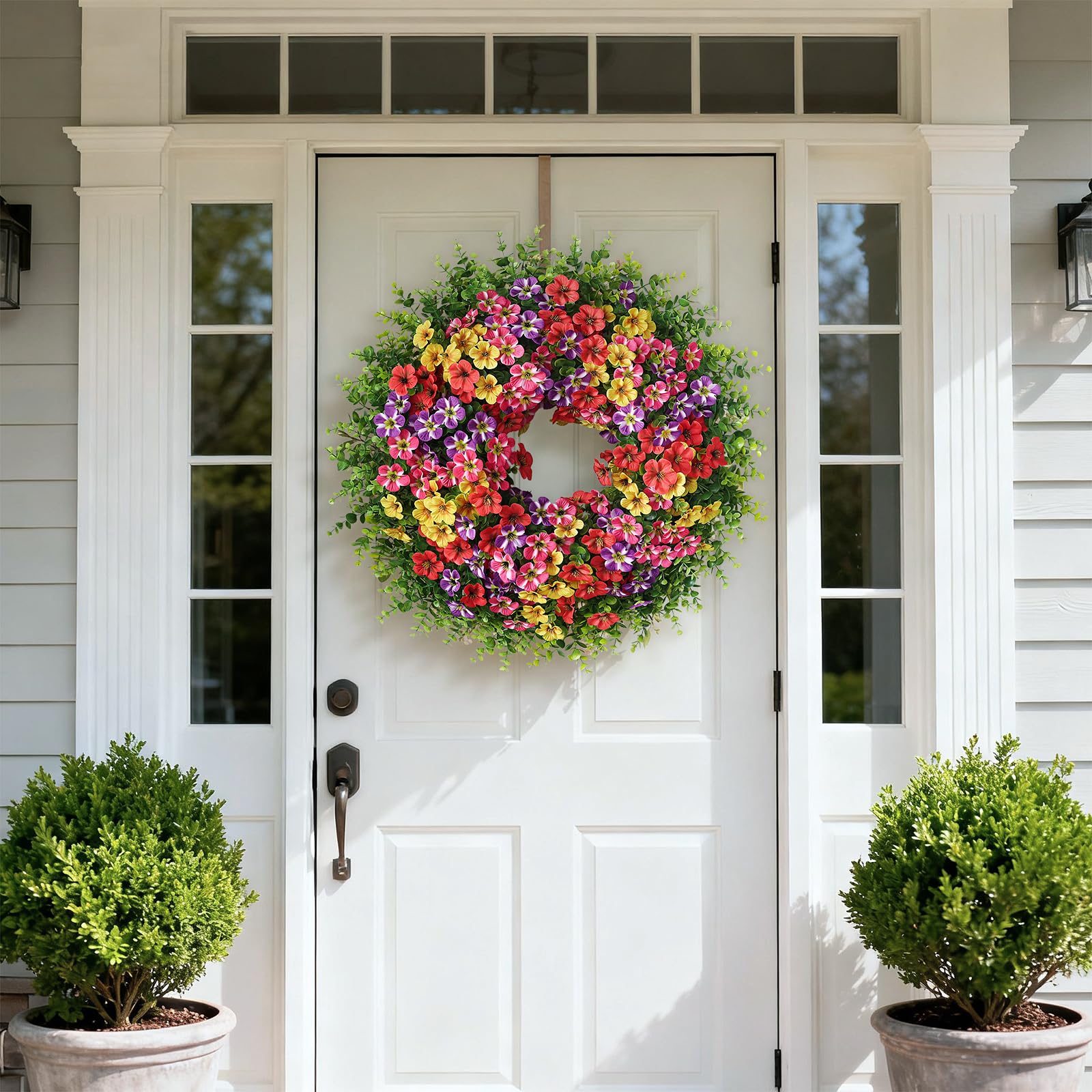 VIERENA indoor-outdoor ready wreath withstands sun and rain with durability.