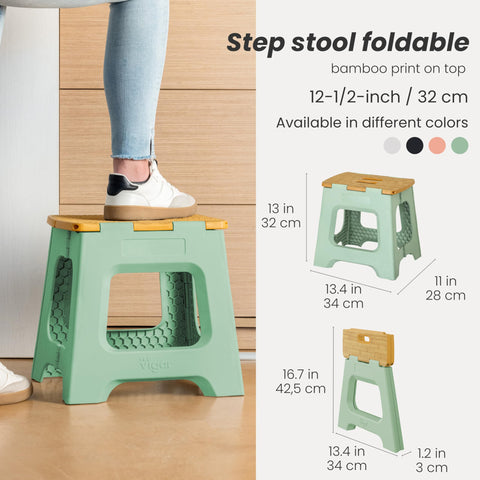Vigar step stool unfolded to reach high shelves safely.