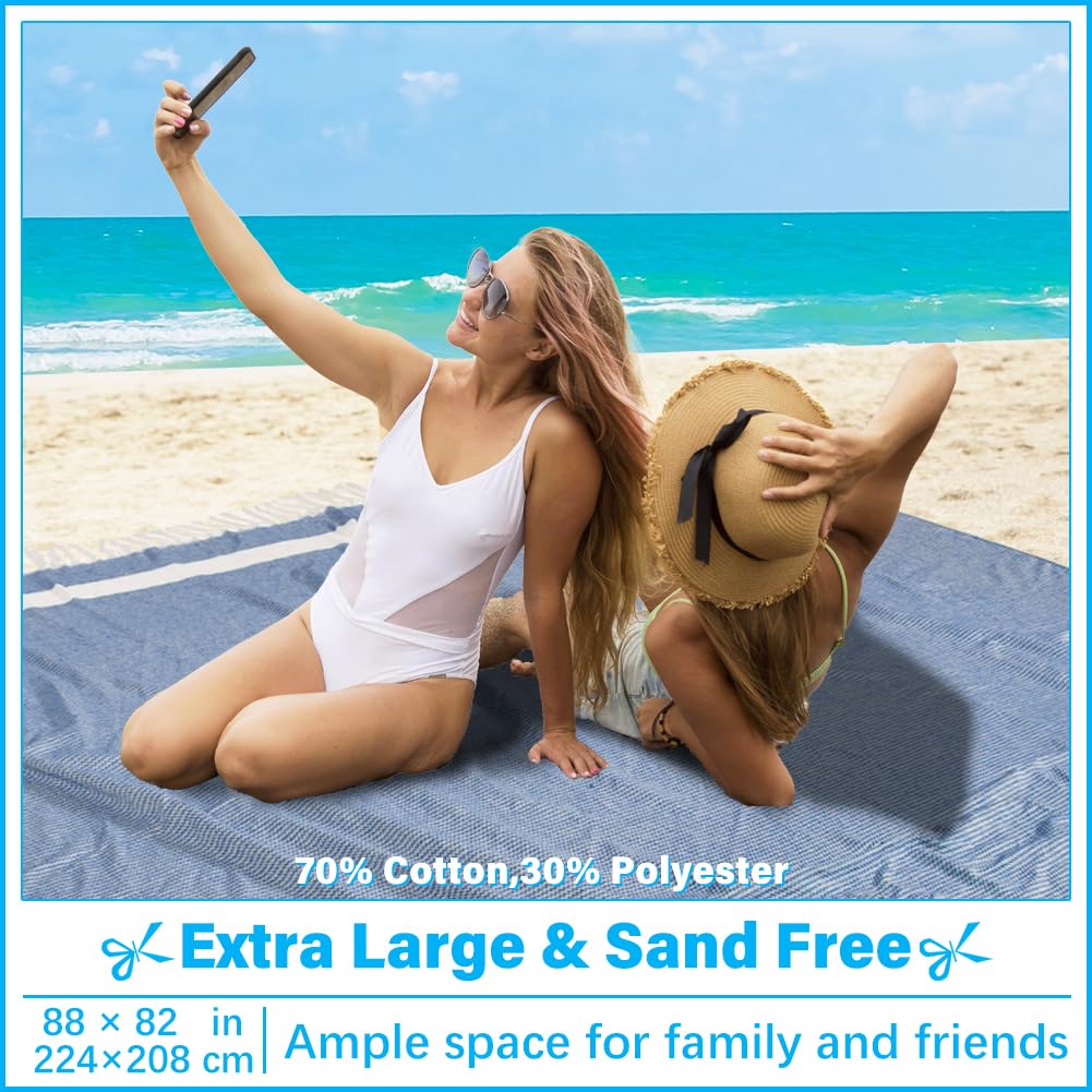 Vikumond blue towel blanket with fringed edges, ideal for cozy beach lounging.