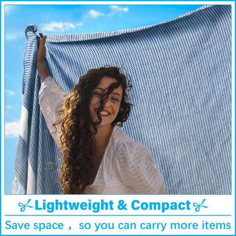 Vikumond blue sandproof towel blanket keeps sand at bay during beach outings.