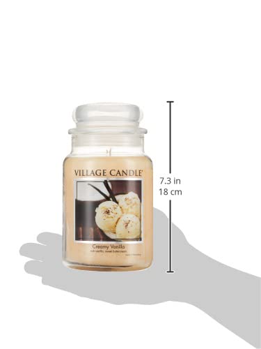 Village Candle apothecary ivory glass jar with warm glow