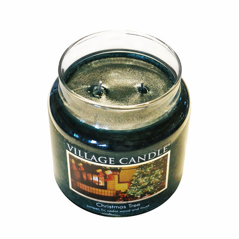 Village Candle green glass apothecary jar; classic decor accent with long-lasting fragrance.