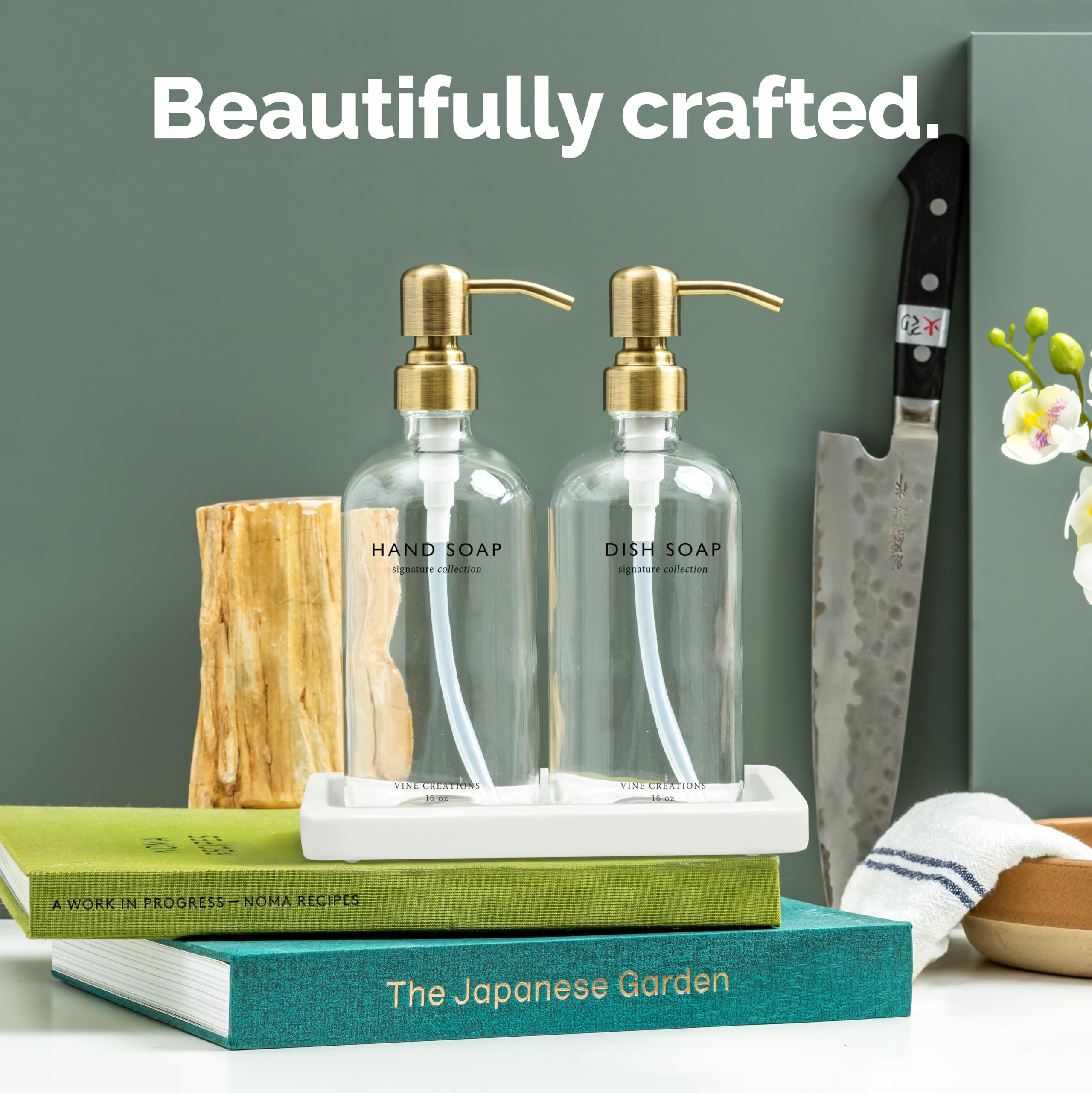 Vine Creations glass soap dispenser set sits with ceramic tray for organized sink.