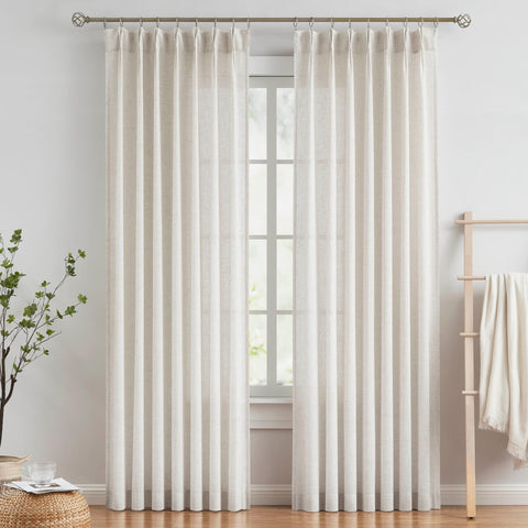 Vision Home pinched-pleated curtains provide a polished living room look.