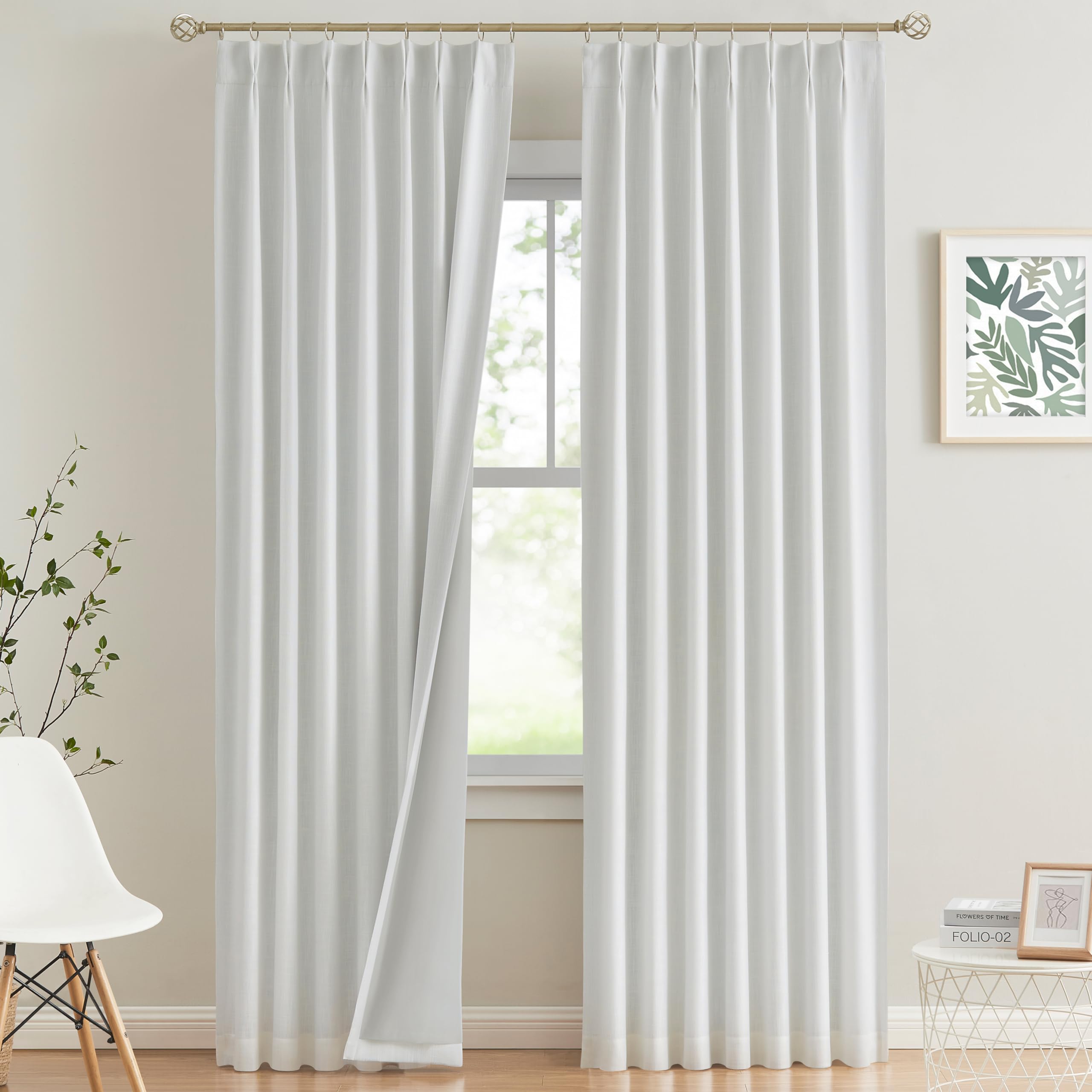 Vision Home white pinch-pleated curtains in a two-panel setup for enhanced privacy
