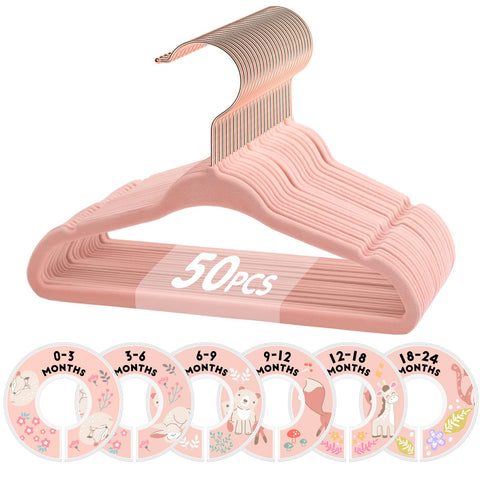 VIS'V baby hangers in pink velvet grip delicate fabrics and keep outfits neatly organized.