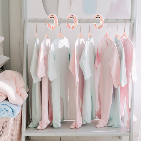 Pink color adds a soft, cozy touch to any baby closet.
