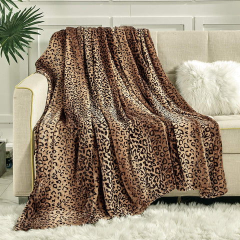 Viviland king size flannel fleece blanket on bed for cozy warmth.