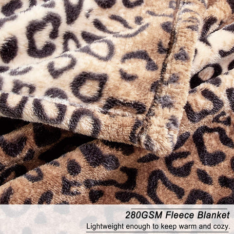 Leopard print pattern on blanket adds stylish bedroom accent.