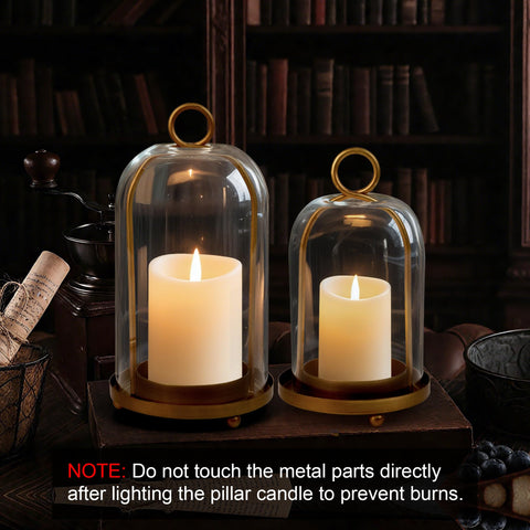 VIVIRENOIR antique brass candle holder with hurricane glass adds vintage charm.