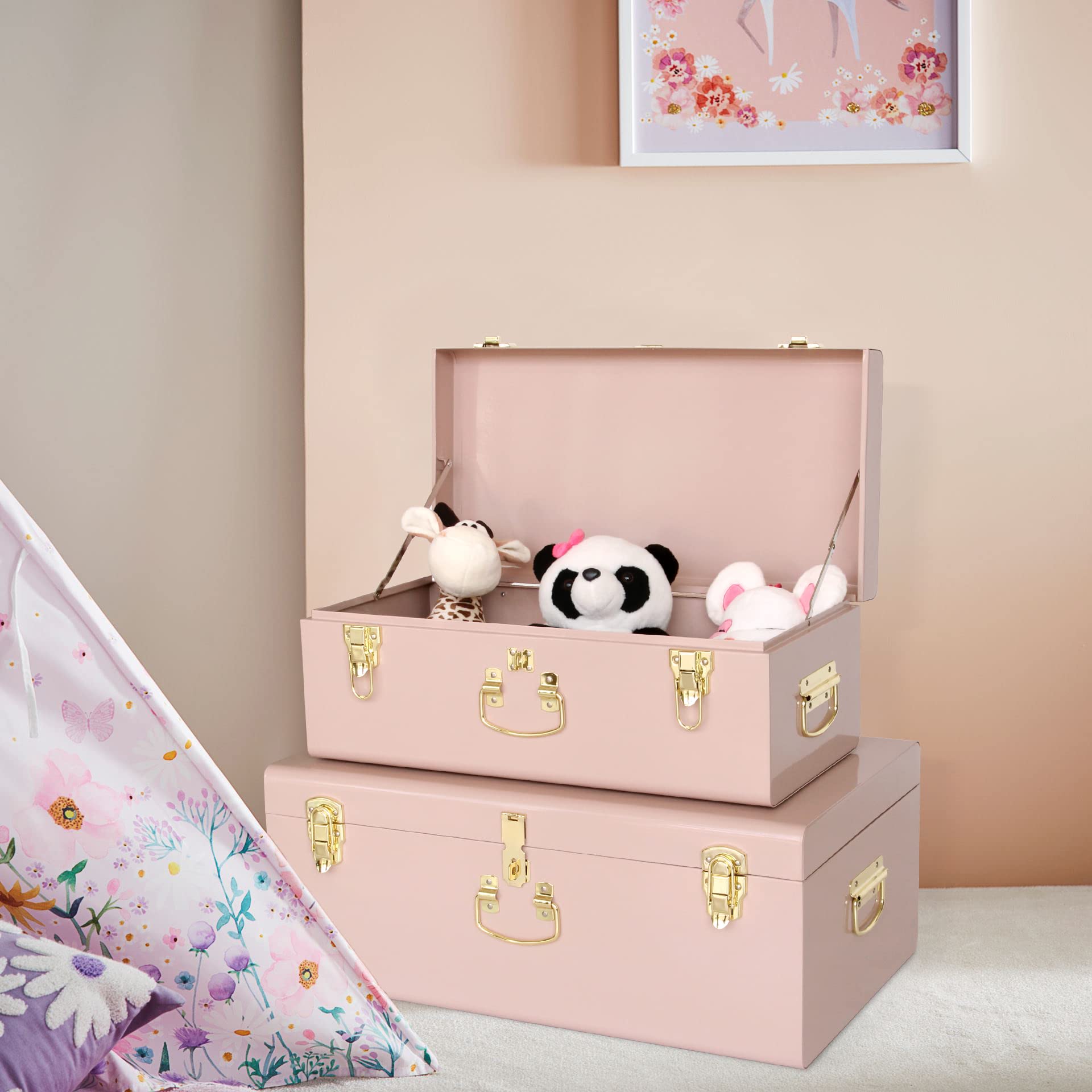 Sunken handles integrated into the pink trunk sides for easy transport.