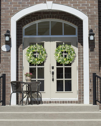 Vlorart wreath with berries and greenery, crafted by hand