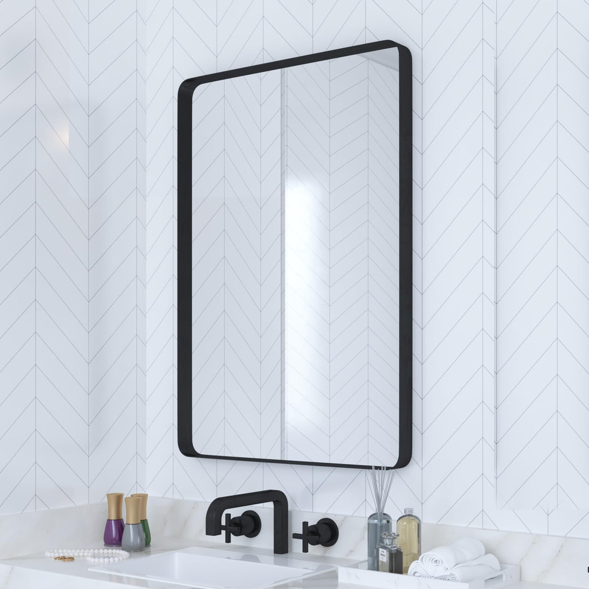 VocalStar black bathroom mirror with 18x26-inch rounded frame over a vanity.