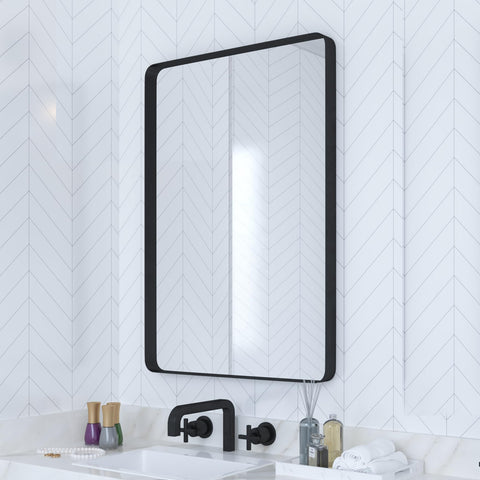 VocalStar black bathroom mirror with 18x26-inch rounded frame over a vanity.