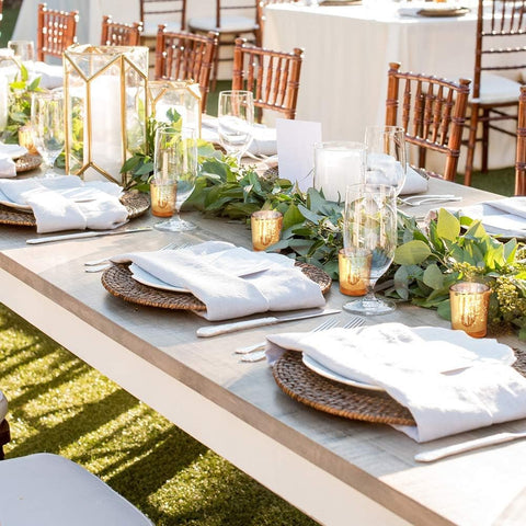 Volens mercury glass votive centerpieces enhance wedding tables with a vintage glow.