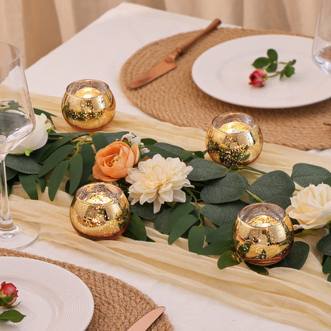 Volens gold votive holder featuring silver fleck pattern and festive shine