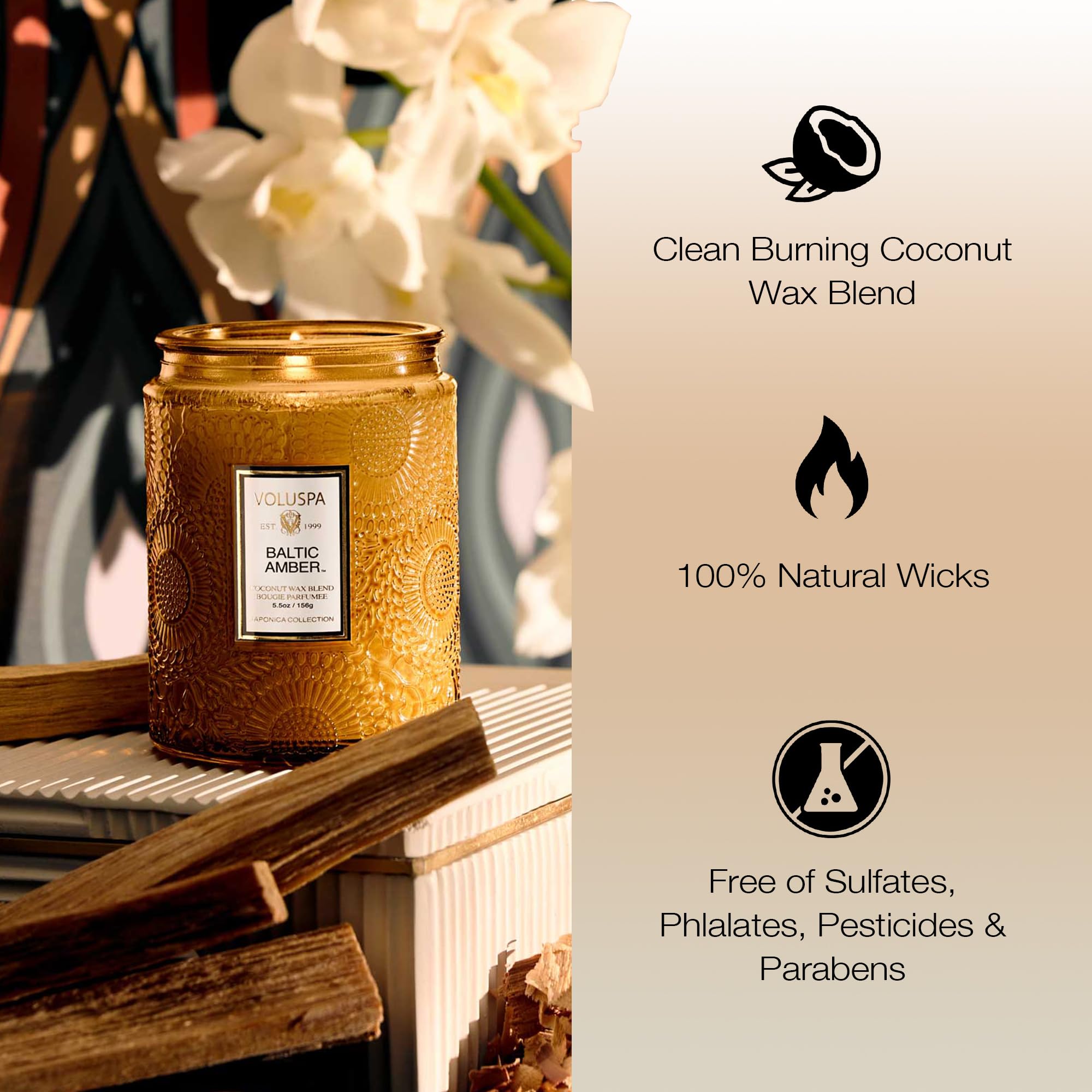 Voluspa Baltic Amber jar lit with a soft glow for relaxing spaces.